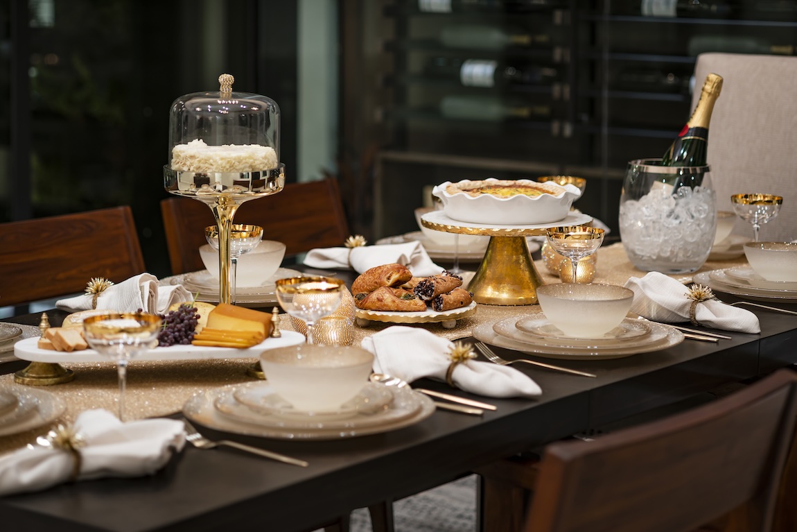 thanksgiving table setting with desserts and decor