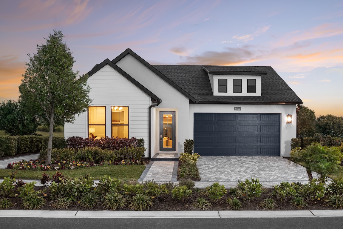 exterior of home with navy blue accents and door.