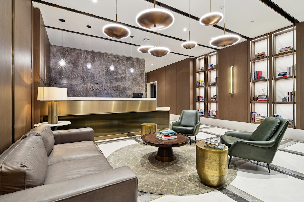 luxury lobby of apartment building with seating and abstract lighting
