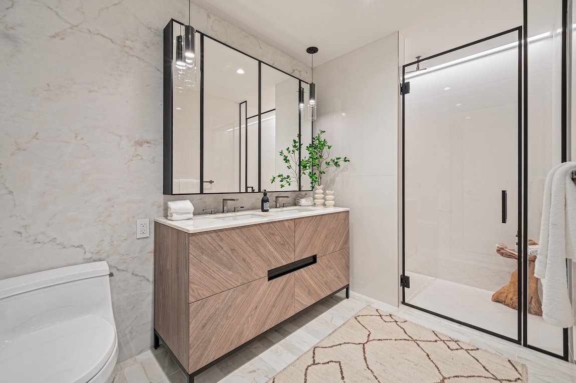 primary bathroom with tile decor and walk-in shower