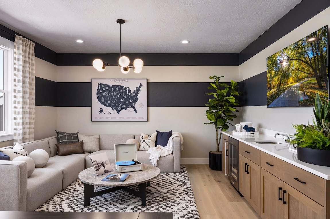 basement with bold striped wallpaper