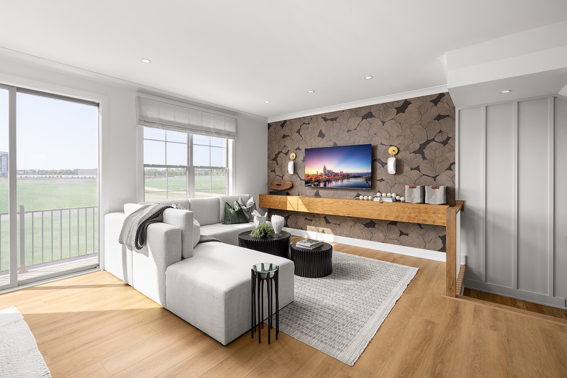 great room with creative wallpaper accent wall