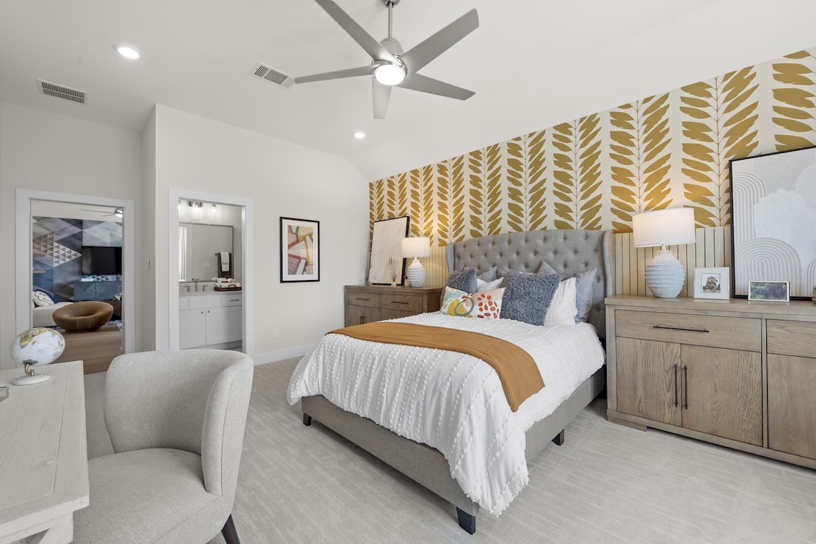 secondary bedroom with creative wallpaper and wooden bedside tables