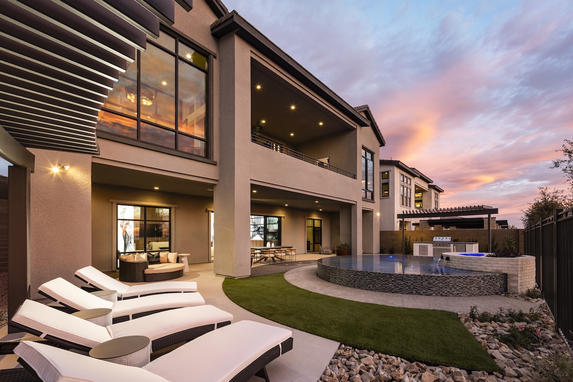 outdoor living space with lounge seating and a beautiful sunset
