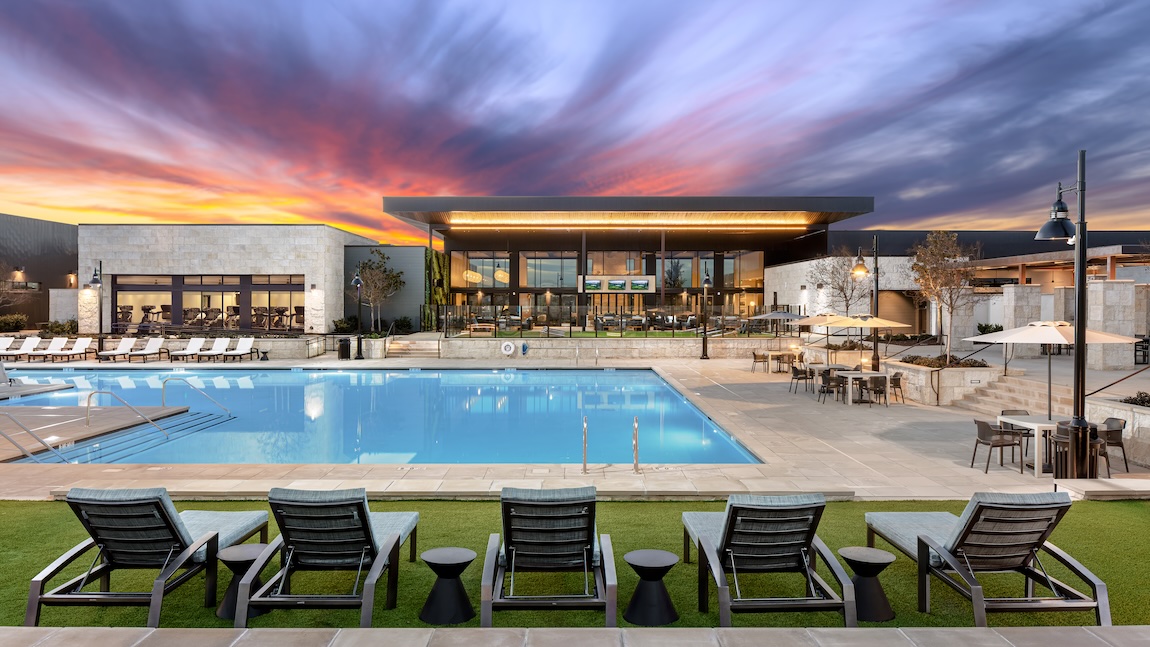 expansive amenity center with pool and poolside seating
