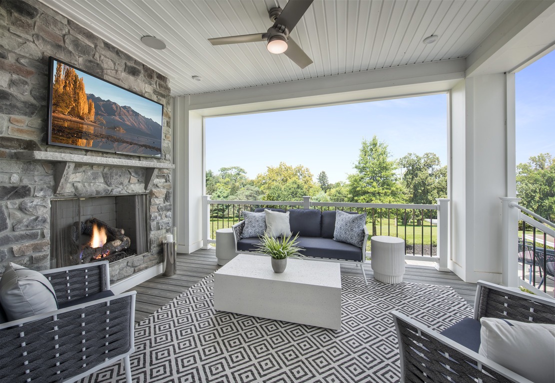 deck with fireplace and TV entertainment space