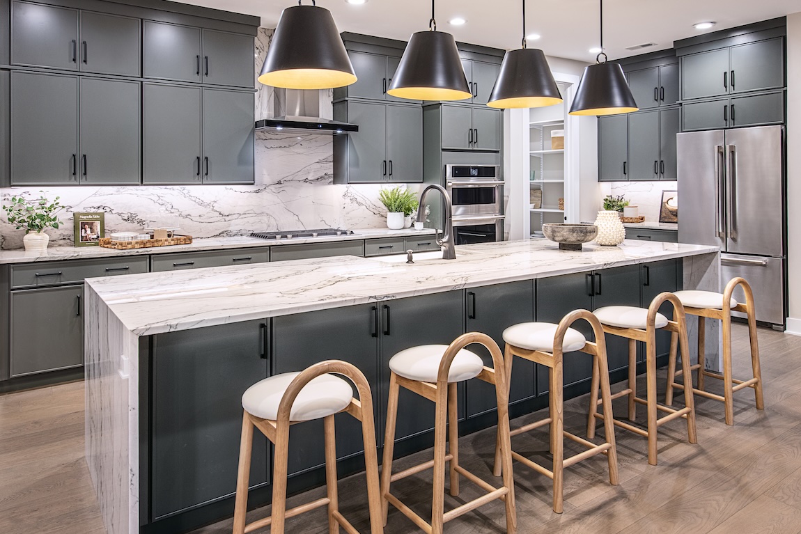 modern kitchen island with wooden stools in quick move-in home in Pennsylvania