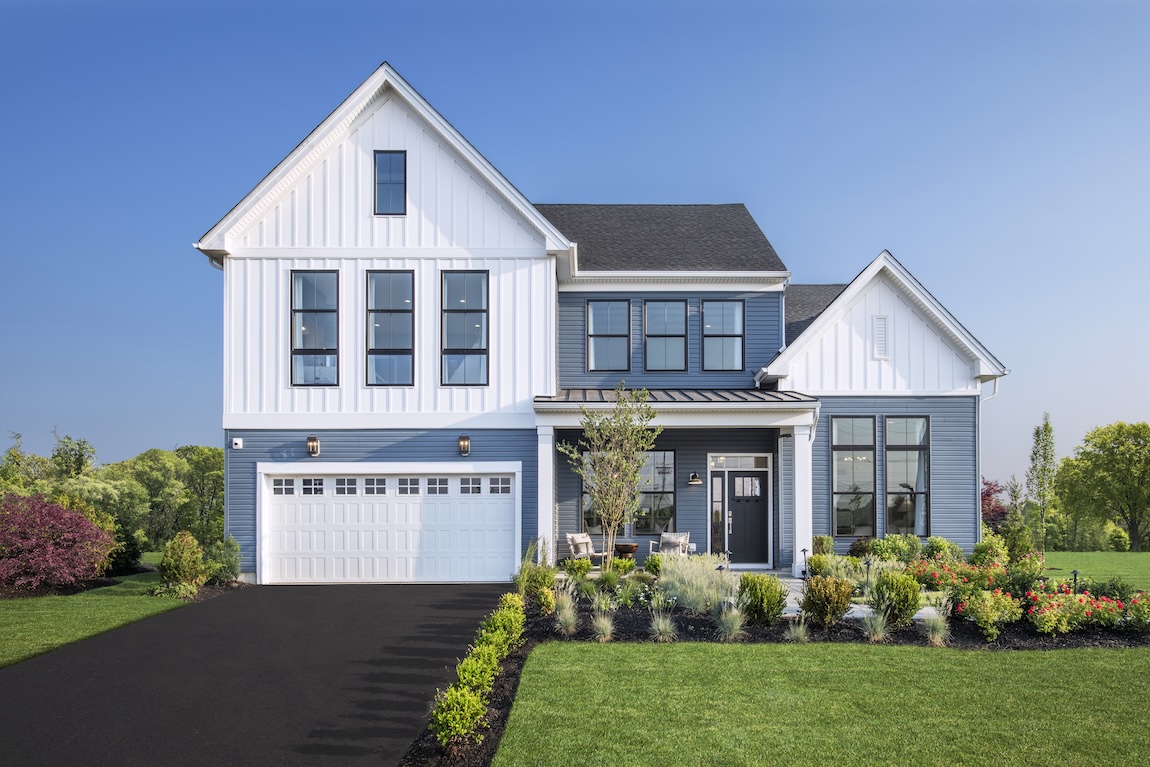 Traditional single-family quick move-in home in Cranbury, NJ with blue exterior accents