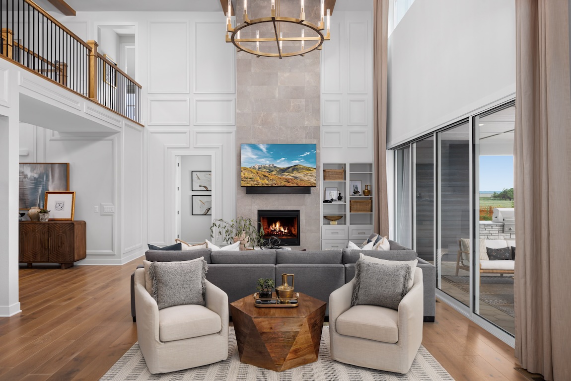 great room with fireplace and stone mantel