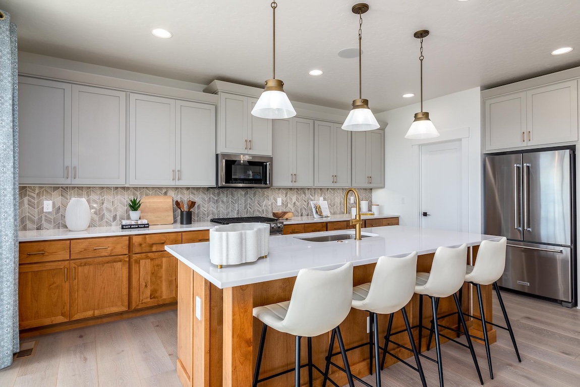modern kitchen with herringbone backsplash
