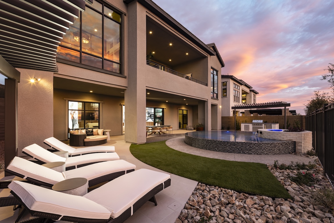 pool and lounge setting with sunset and pergolas for shade