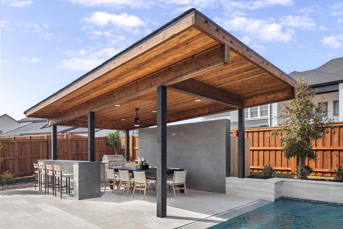 outdoor living space with seating and cover