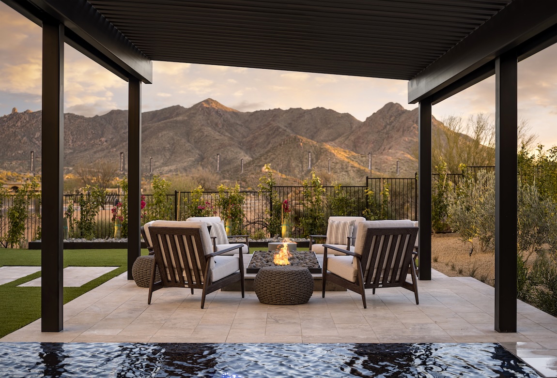 A well-positioned outdoor space provides a mountain view, creating a majestic backdrop when relaxing by the fire.