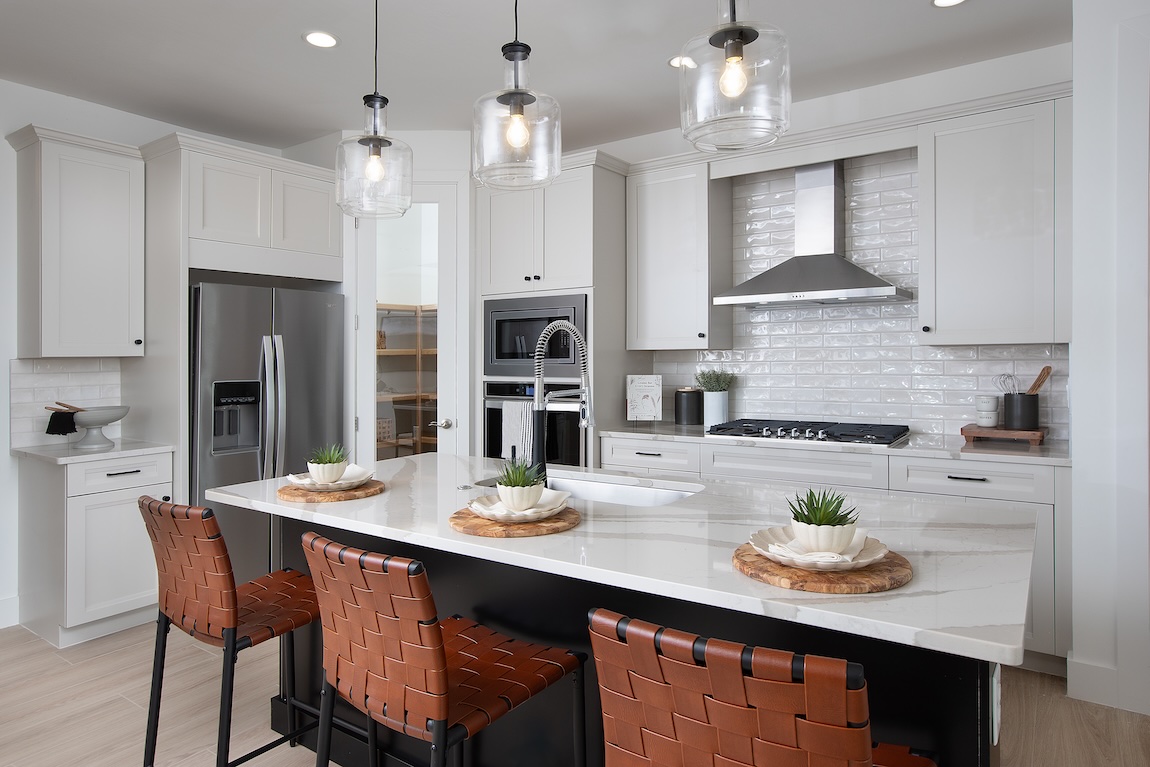 modern white kitchen with subway tile backsplash design