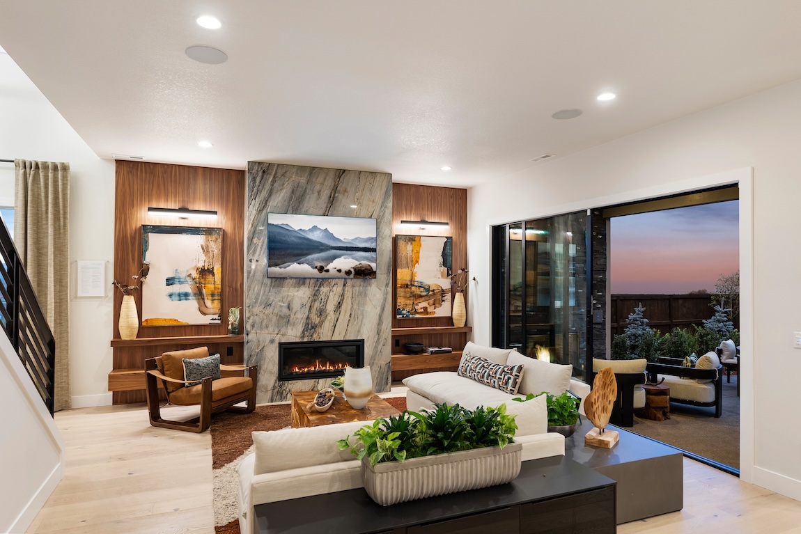 luxe great room design with outdoor transition to patio