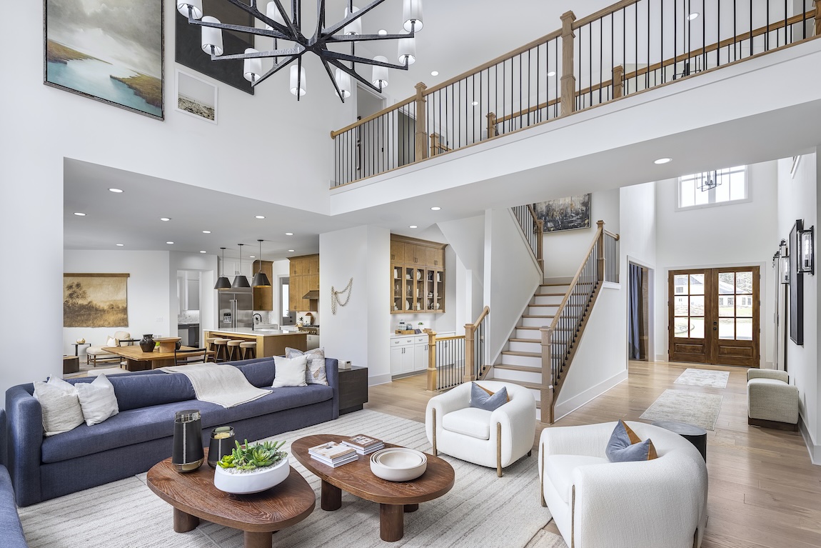 white two-story gream room design