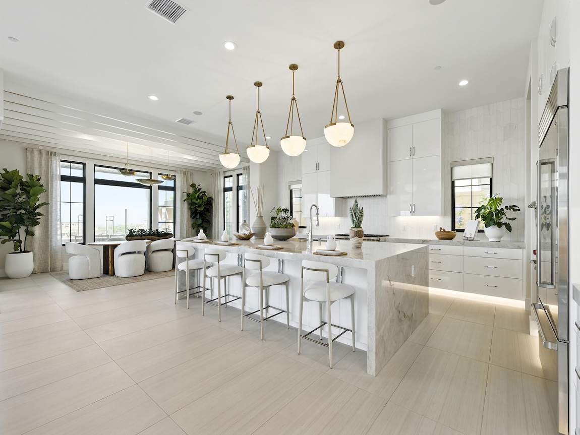elegant white kitchen with pendant lighting