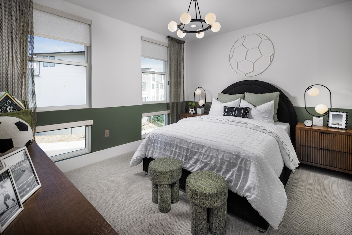 sports-themed bedroom featuring soccer details