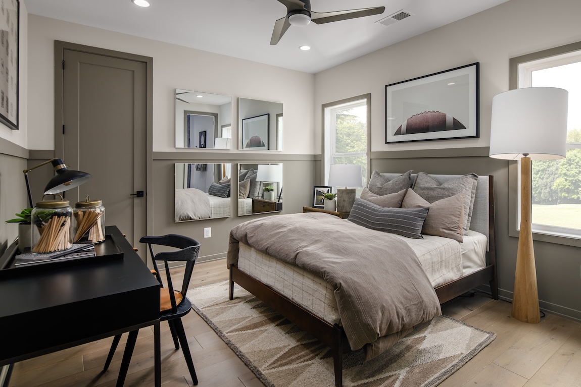 sports-themed bedroom featuring football portrait