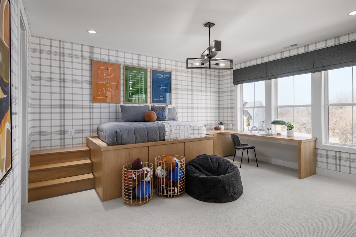 Sports-themed bedroom with an elevate bed.