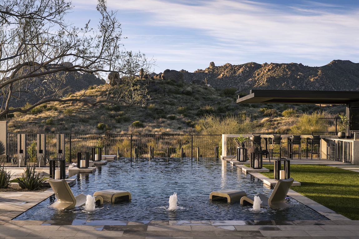 a serene view anyone would fall in love with from pool within the backyard of a Toll Brothers home in Arizona