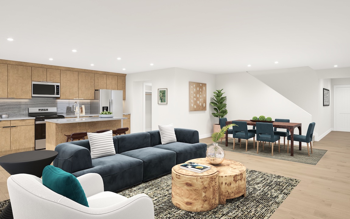 modern living space with open-concept access between the kitchen and living area