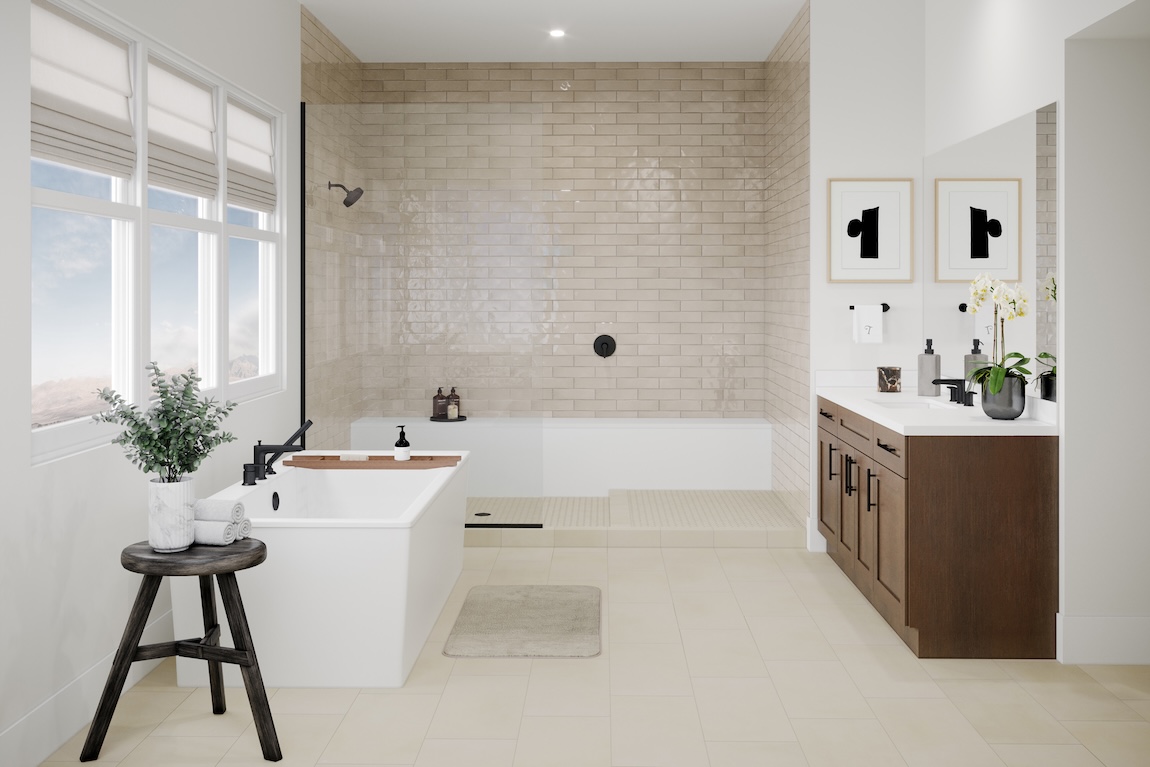Warm transitional primary bathroom with freestanding soaking tub, walk-in tiled shower, wood vanity, and soft neutral finishes.