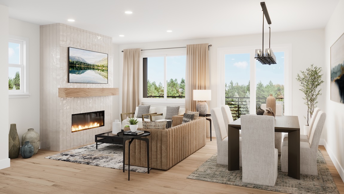 Open great room and dining area with modern fireplace, ribbed sofa, large windows, light wood flooring, and contemporary pendant lighting.