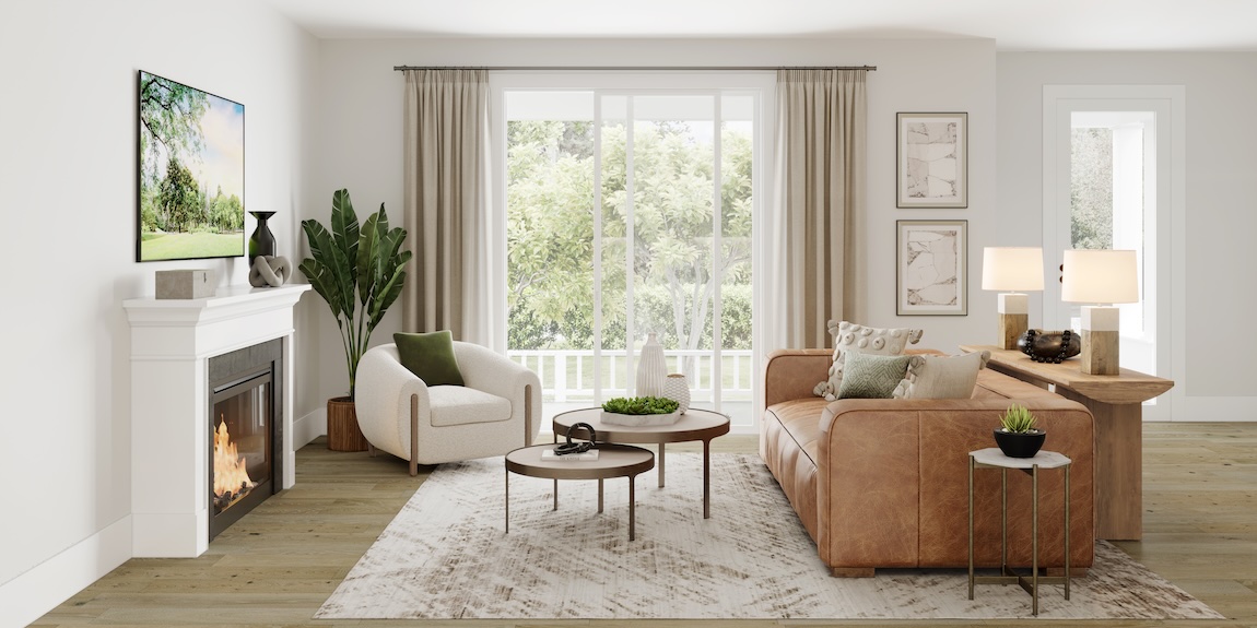 Cozy modern organic great room with fireplace, leather sofa, accent chair, large windows, and warm contemporary styling.