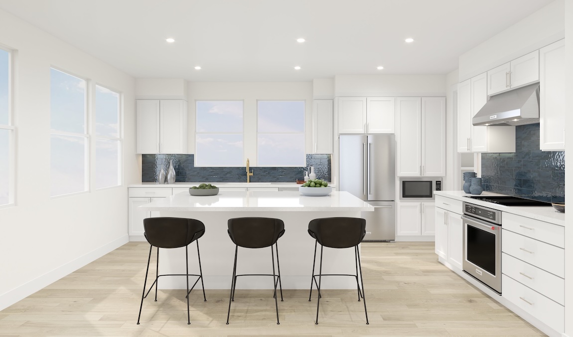 luxury kitchen with white cabinetry and navy blue backsplash.
