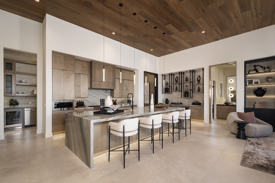 modern kitchen with waterfall island and wooden cabinetry