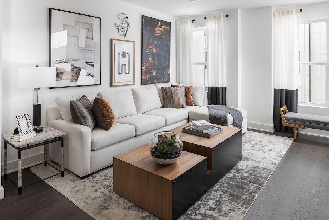 modern living room with sectional sofa and artwork.