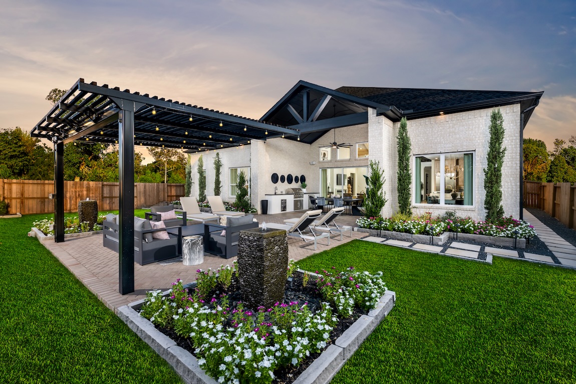outdoor living space with large pergola and seating