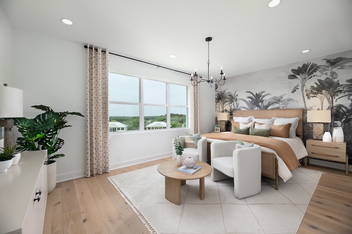primary bedroom with patterned wallpaper