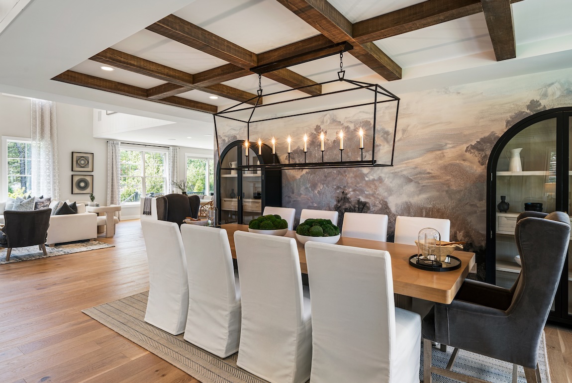 dining room with unique wallpaper and statement chandelier