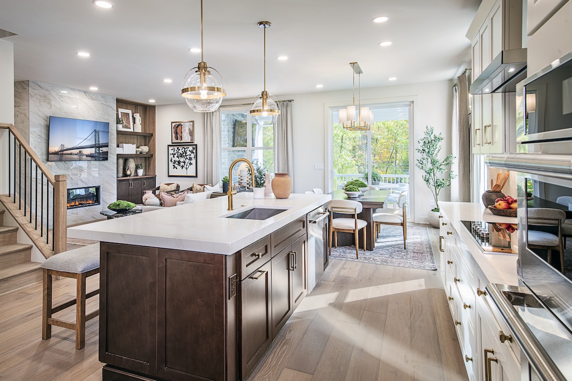 kitchen and living space with sliding glass doors to the outdoor living space