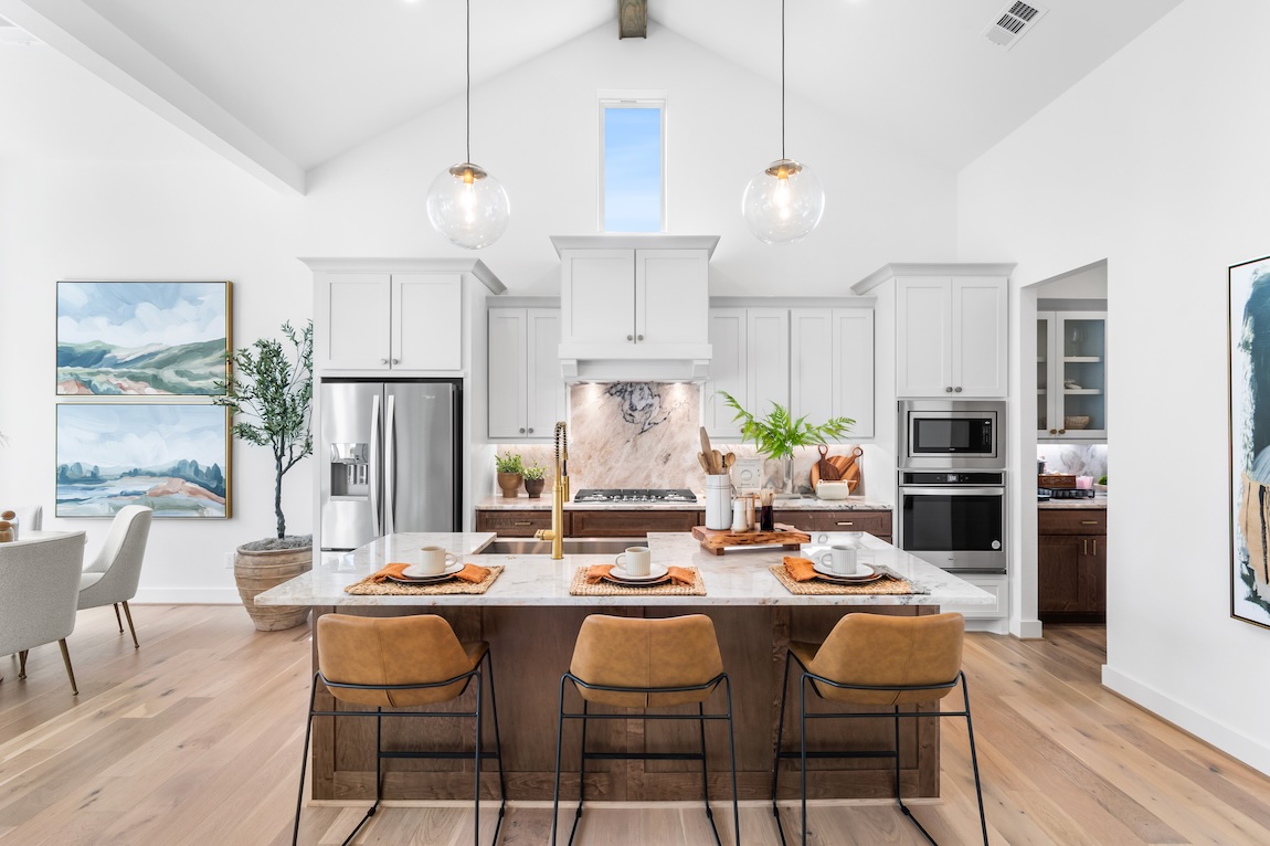 modern kitchen with large wooden island and seating