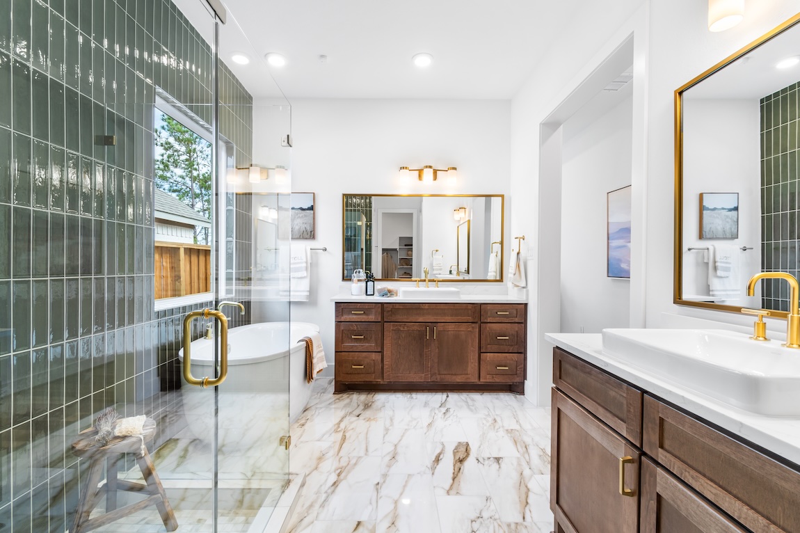 primary bathroom with green tile wall