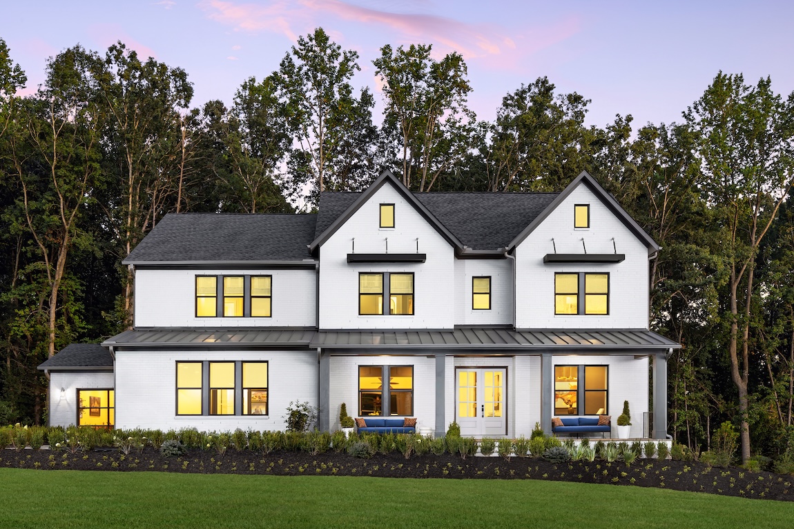 exterior of home with front porch and black and white detailing