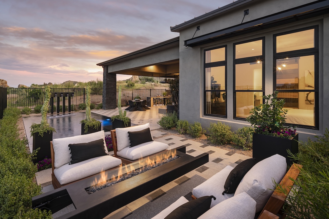 outdoor living space with fire pit and lounge seating