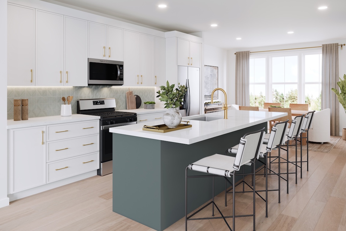 modern kitchen with white cabinetry and countertops.