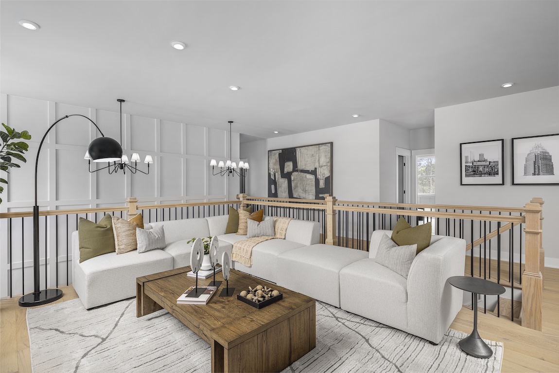 Modern loft with sectional sofa and neutral colors.