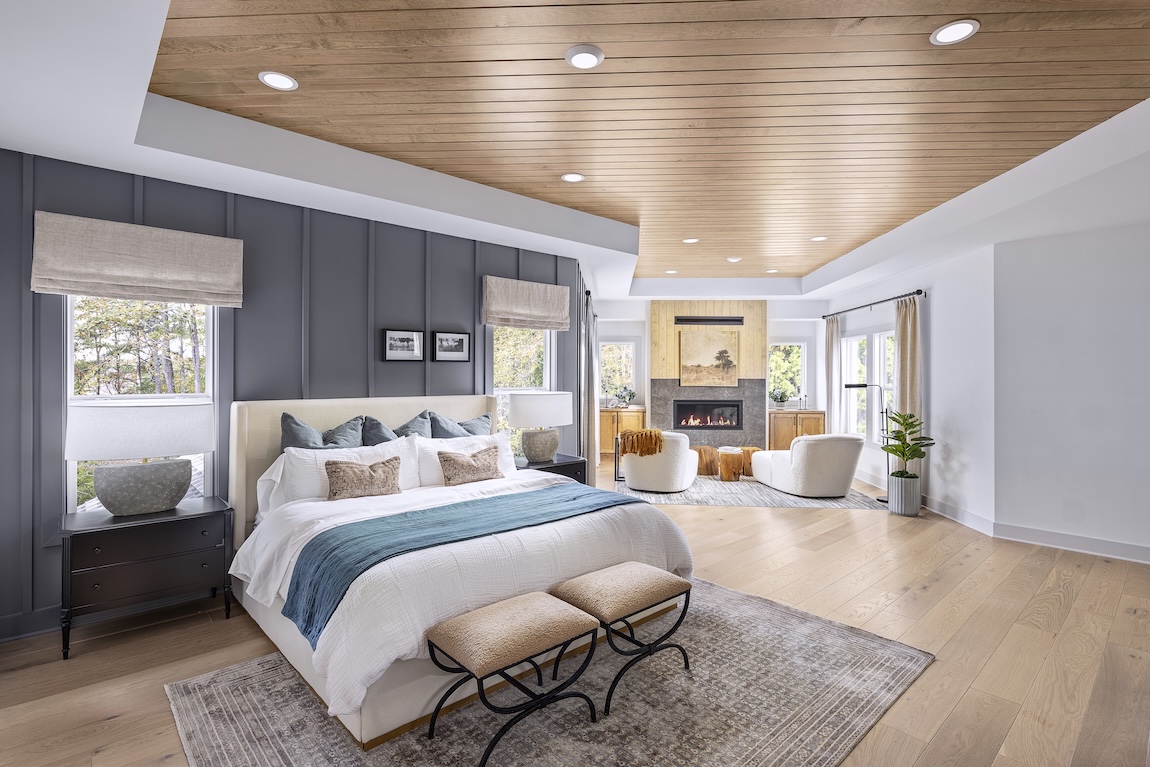 Primary bedroom with reading nook and fireplace
