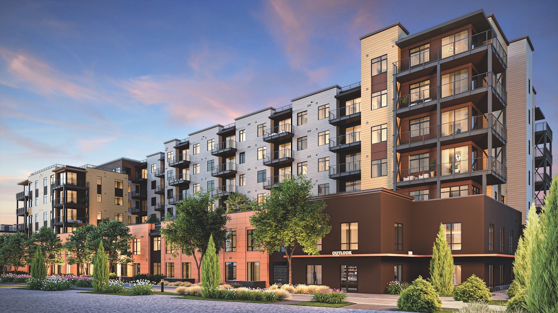 exterior of condominiums with greenery out front
