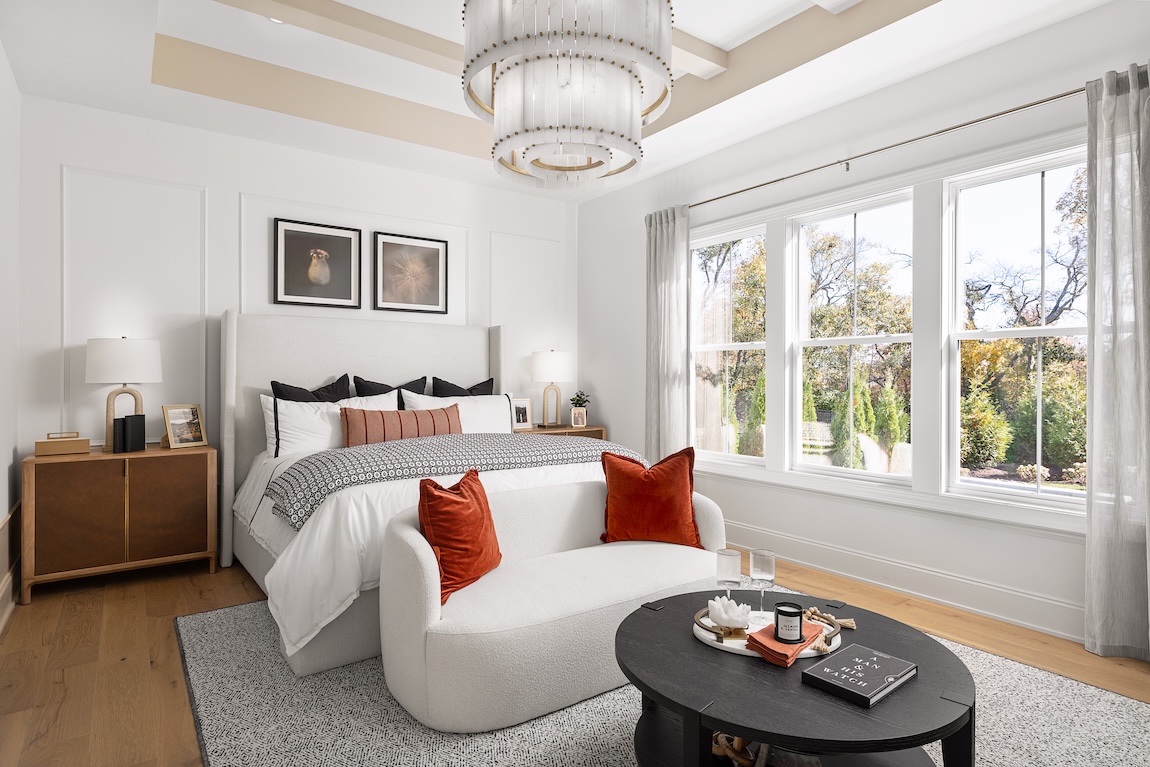 primary bedroom with white interior design.
