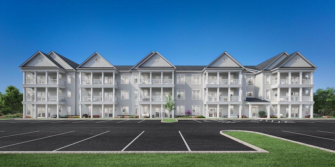 exterior of condos with parking lot