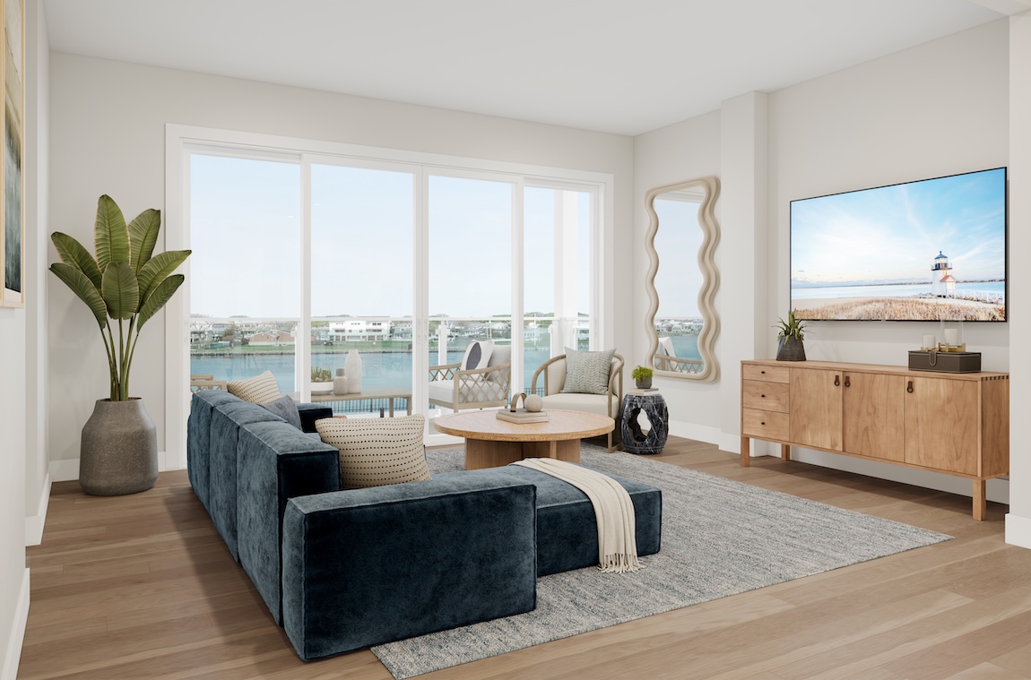 Living room with water views and modern design.