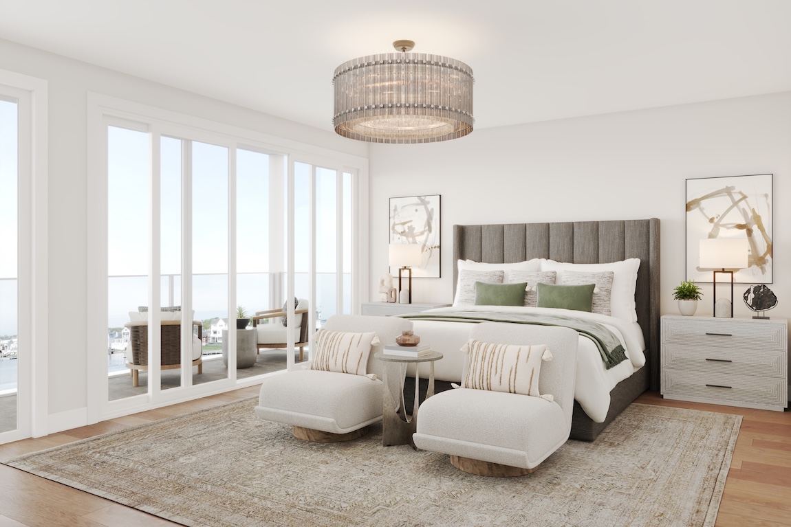 primary bedroom with balcony and water views.