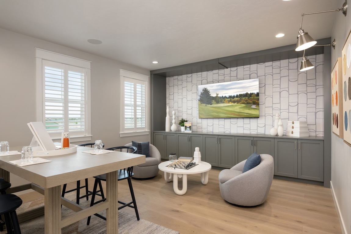 flex room with art table and comfortable seating