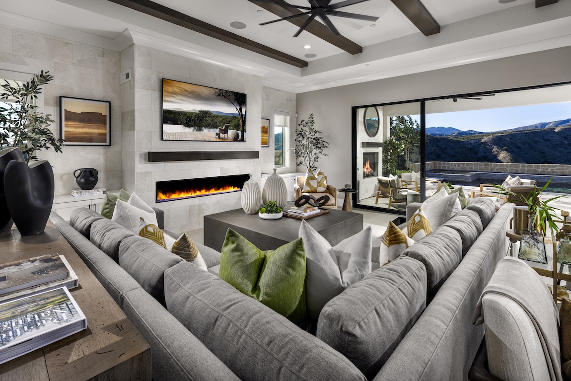 living room with sofa and sliding glass doors to the outdoor patio